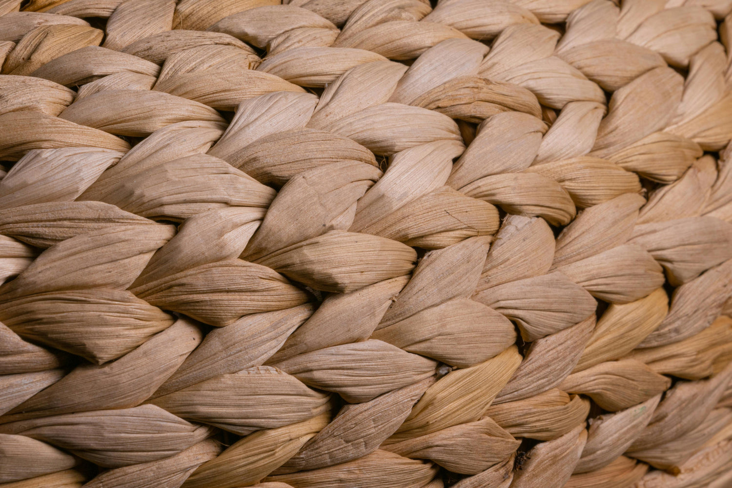 Close-up of natural water hyacinth weave pattern used in EcoLuxLiven baskets”
